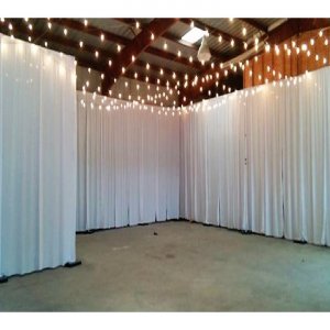 Pipe & Drape With White Curtains