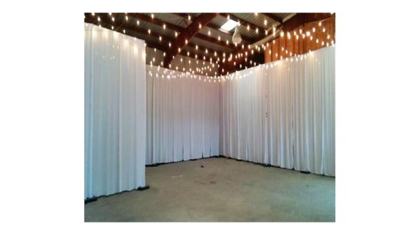 Pipe & Drape With White Curtains